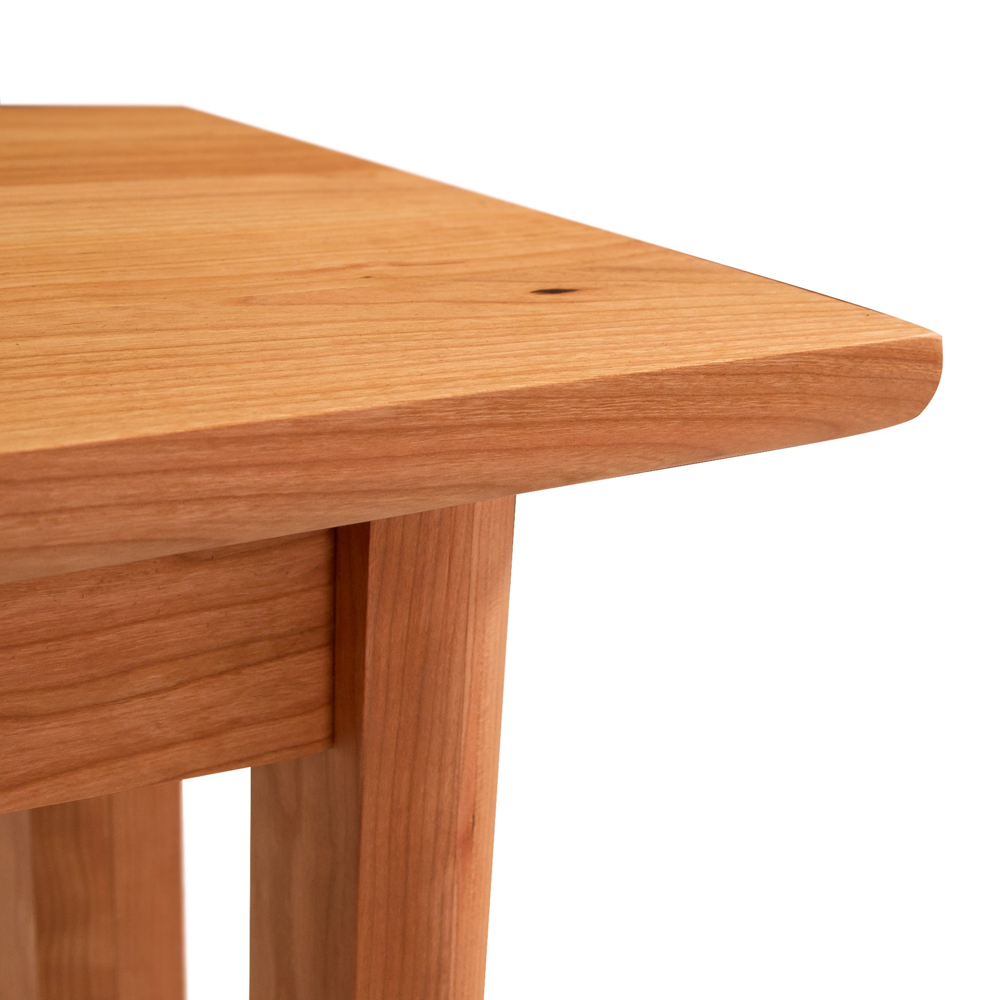 Heartwood Shaker Bench by Vermont Furniture Designs, crafted from solid wood with eco-friendly finish and detailed grain, shown against a white background.