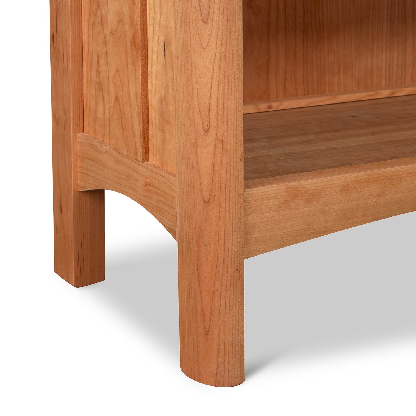 Heartwood Shaker Custom Bookcase by Vermont Furniture Designs featuring detailed shelves and legs, showcasing fine American craftsmanship.