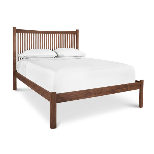 Heartwood Shaker Low Footboard Bed by Vermont Furniture Designs featuring a vertical slat headboard, shown with white bedding and pillows.