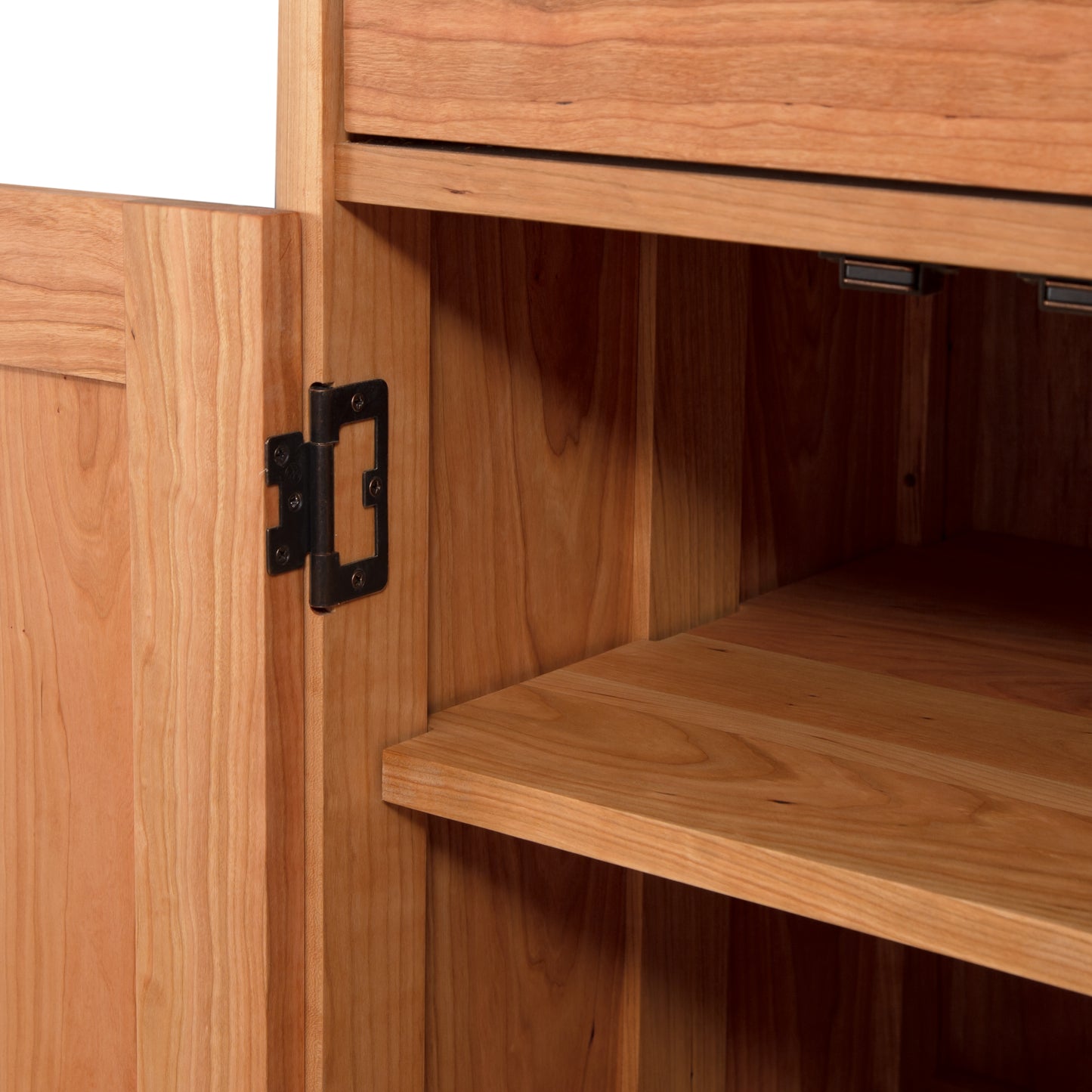 Heartwood Shaker Short Storage Chest by Vermont Furniture Designs, highlighting its craftsmanship, metal hinges, and two wooden shelves.