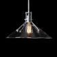 Hubbardton Forge Henry Medium Pendant showcasing contemporary lines and a visible bulb, highlighting its modern design.