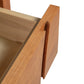 Lyndon Furniture Holland 1-Drawer Open Shelf Nightstand featuring a cutout handle, open shelf, and partially open drawer in finely crafted wood.