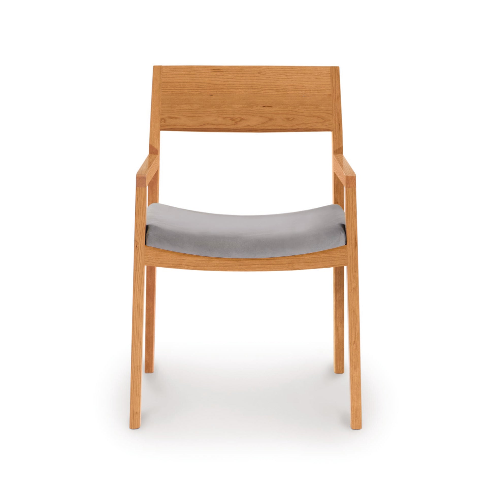 Copeland Furniture Iso Chair crafted from sustainable hardwood, featuring a straight back, armrests, and gray upholstered seat.