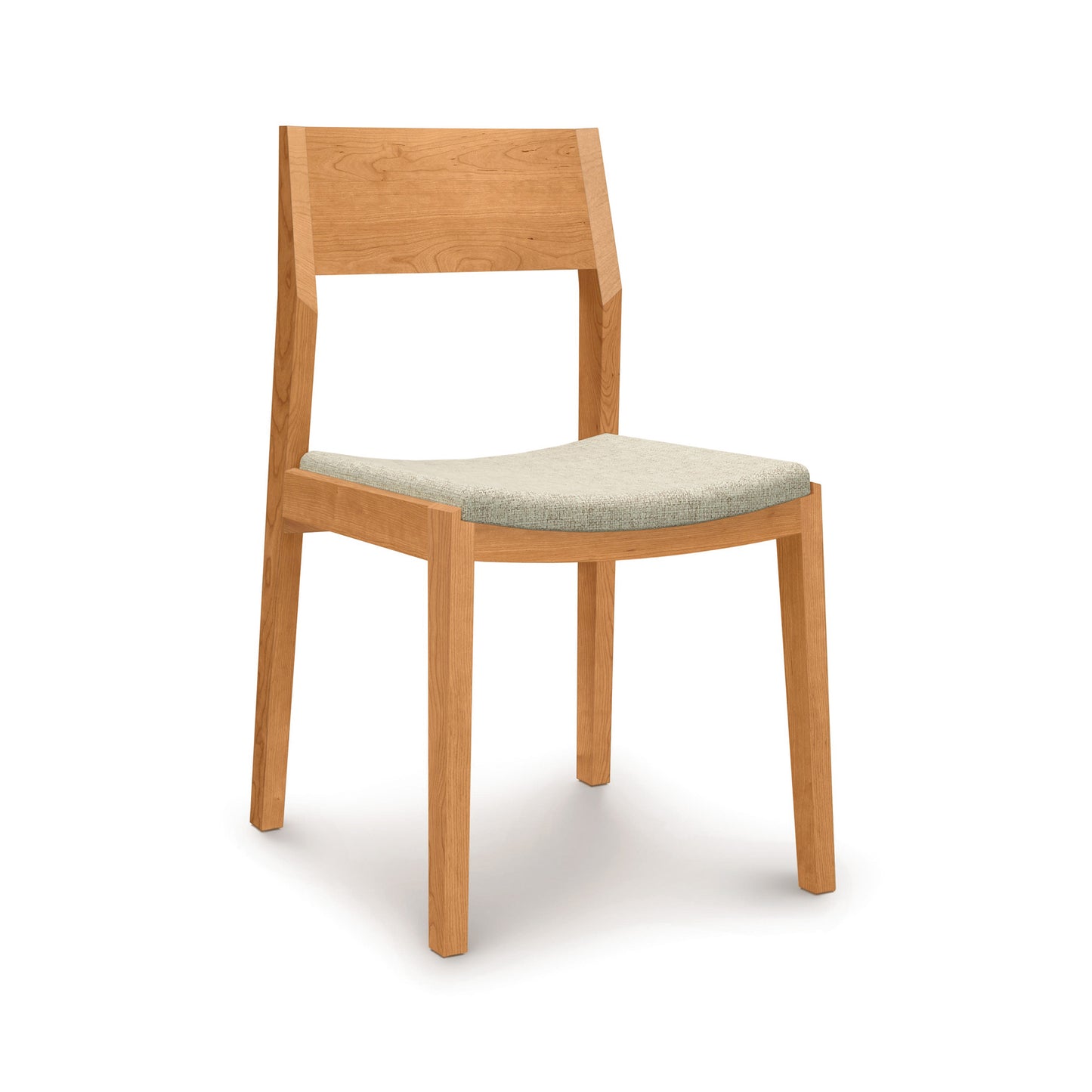 Iso Side Chair by Copeland Furniture with a light upholstered seat, angled backrest, and solid sustainably sourced hardwood frame, American made.