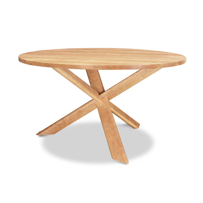 Junction Solid Top Table by Lyndon Furniture with a sleek solid wood surface and distinctive angled legs in a natural finish.