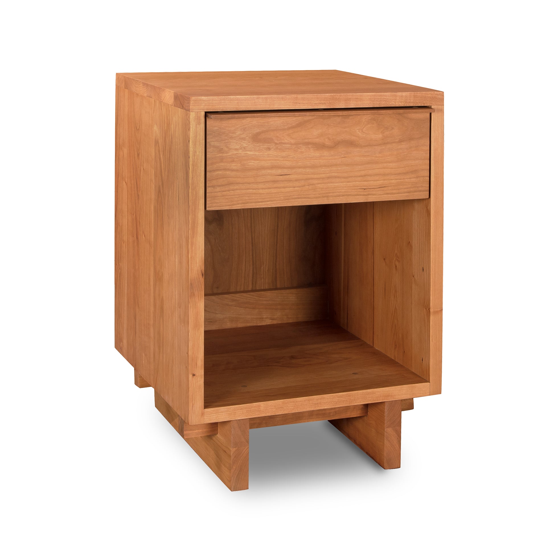 Kipling 1-Drawer Enclosed Shelf Nightstand by Vermont Furniture Designs, featuring a sleek design with a single drawer and rich display of natural wood grain.