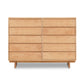 10-drawer Kipling Dresser by Vermont Furniture Designs, showcasing a minimalist silhouette with a natural finish and flat base.