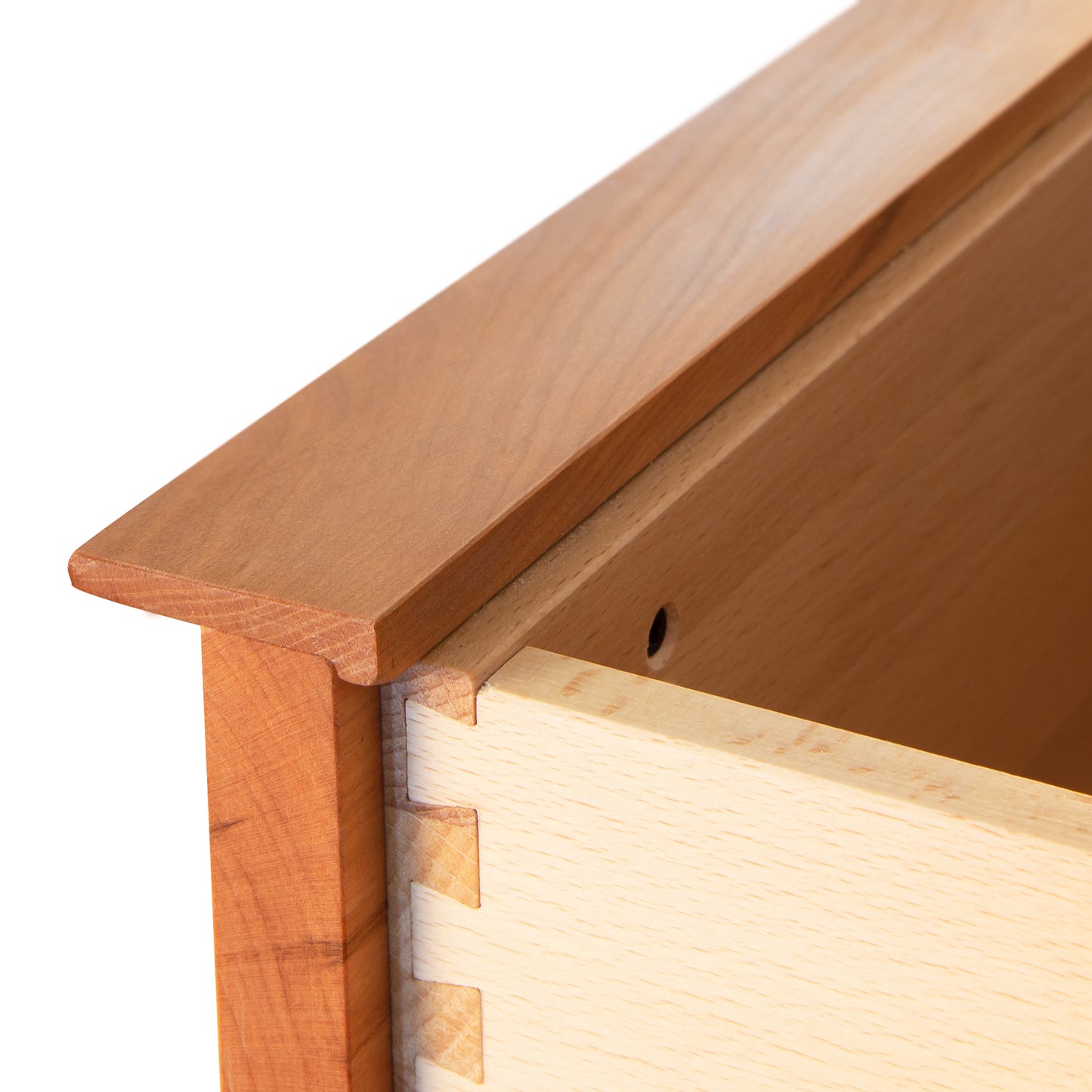 Vermont Furniture Designs Kipling Nightstand drawer showcasing precise dovetail joints and a sleek, modern wooden finish.