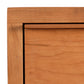 Kipling 3-Drawer Nightstand by Vermont Furniture Designs showcasing its distinct wood grain, sleek modern design, and smooth finish.