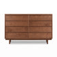 Vermont Furniture Designs Kipling 8-Drawer Dresser in white solid wood, featuring clean lines and mid-century modern style.