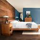 Customizable Kipling Bed by Vermont Furniture Designs with wooden frame, highlighting the craftsmanship and elegance.