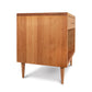Larssen 1-Drawer Wide Nightstand crafted in natural hardwood with clean lines, tapered legs, and mid-century modern elegance by Vermont Furniture Designs.