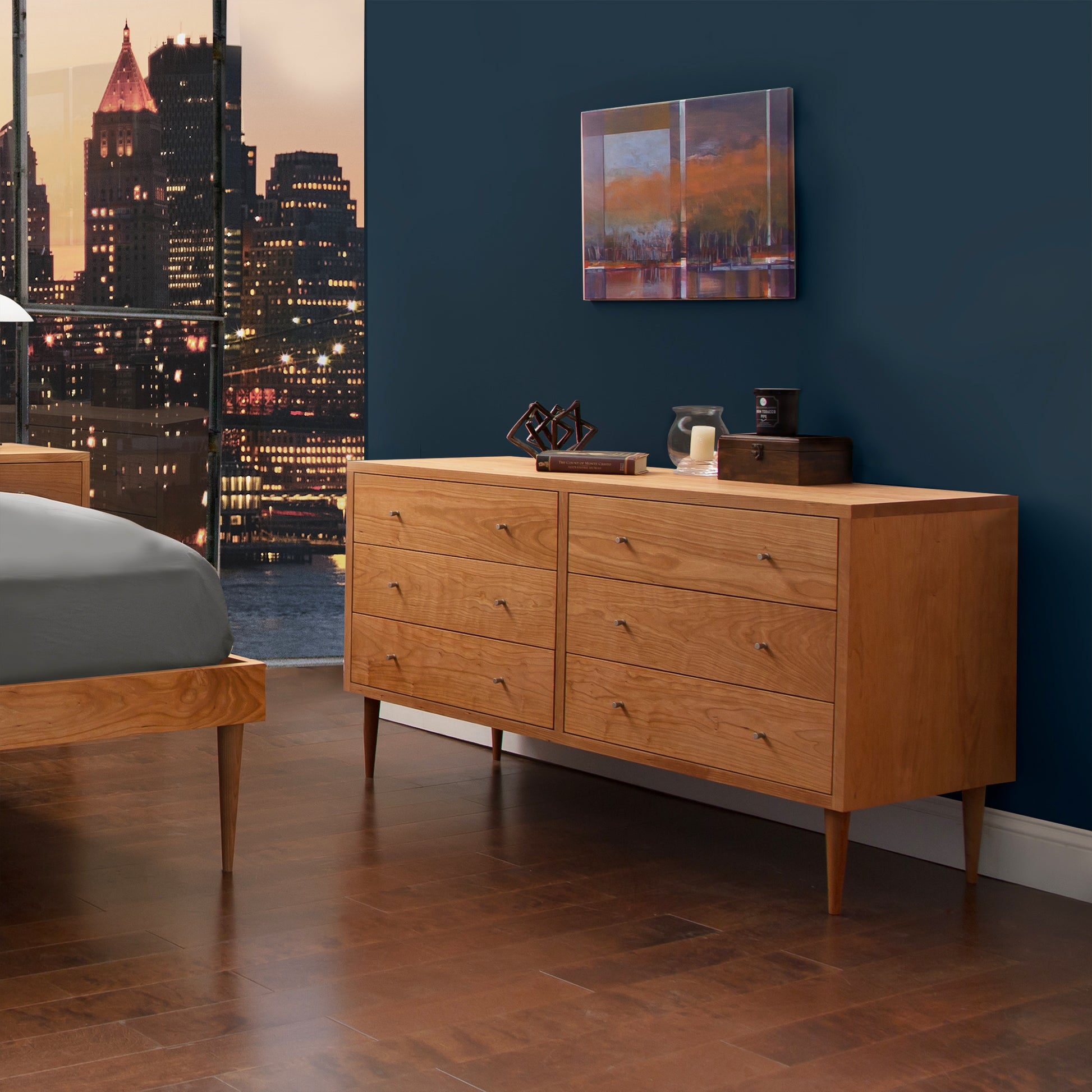 Larssen 6-Drawer Dresser by Vermont Furniture Designs showcasing its elegant craftsmanship and ample storage against a soft backdrop.