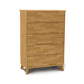 Linn 5-Drawer Wide Chest by Copeland Furniture in light brown wood with angled legs, showcasing mid-century modern design.