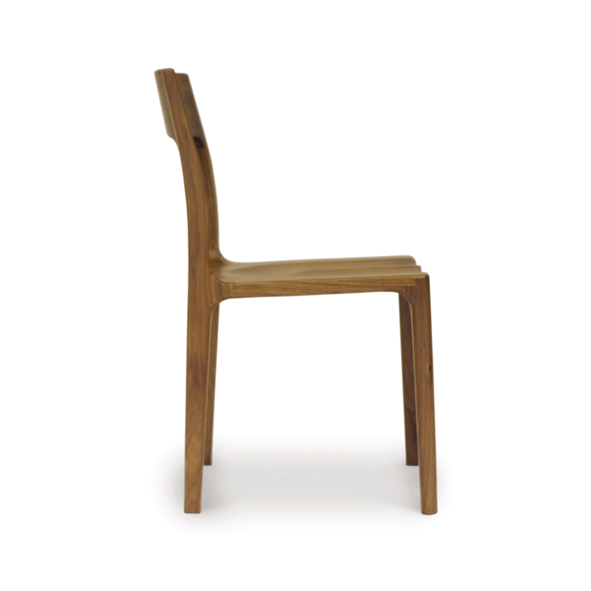 Lisse Dining Chair by Copeland Furniture in North American black walnut.