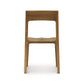 Lisse Dining Chair from Copeland Furniture in solid North American black walnut with a sleek backrest and smooth finish.