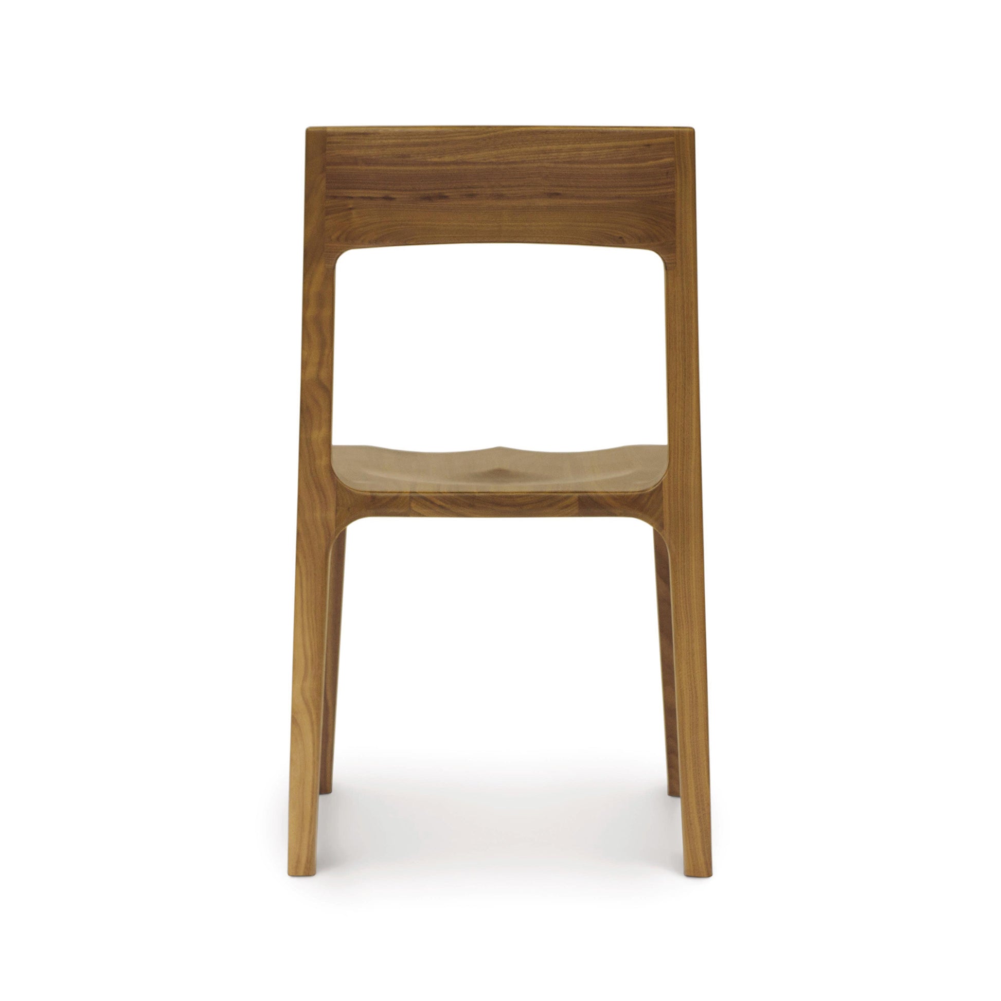 Lisse Dining Chair from Copeland Furniture in solid North American black walnut with a sleek backrest and smooth finish.
