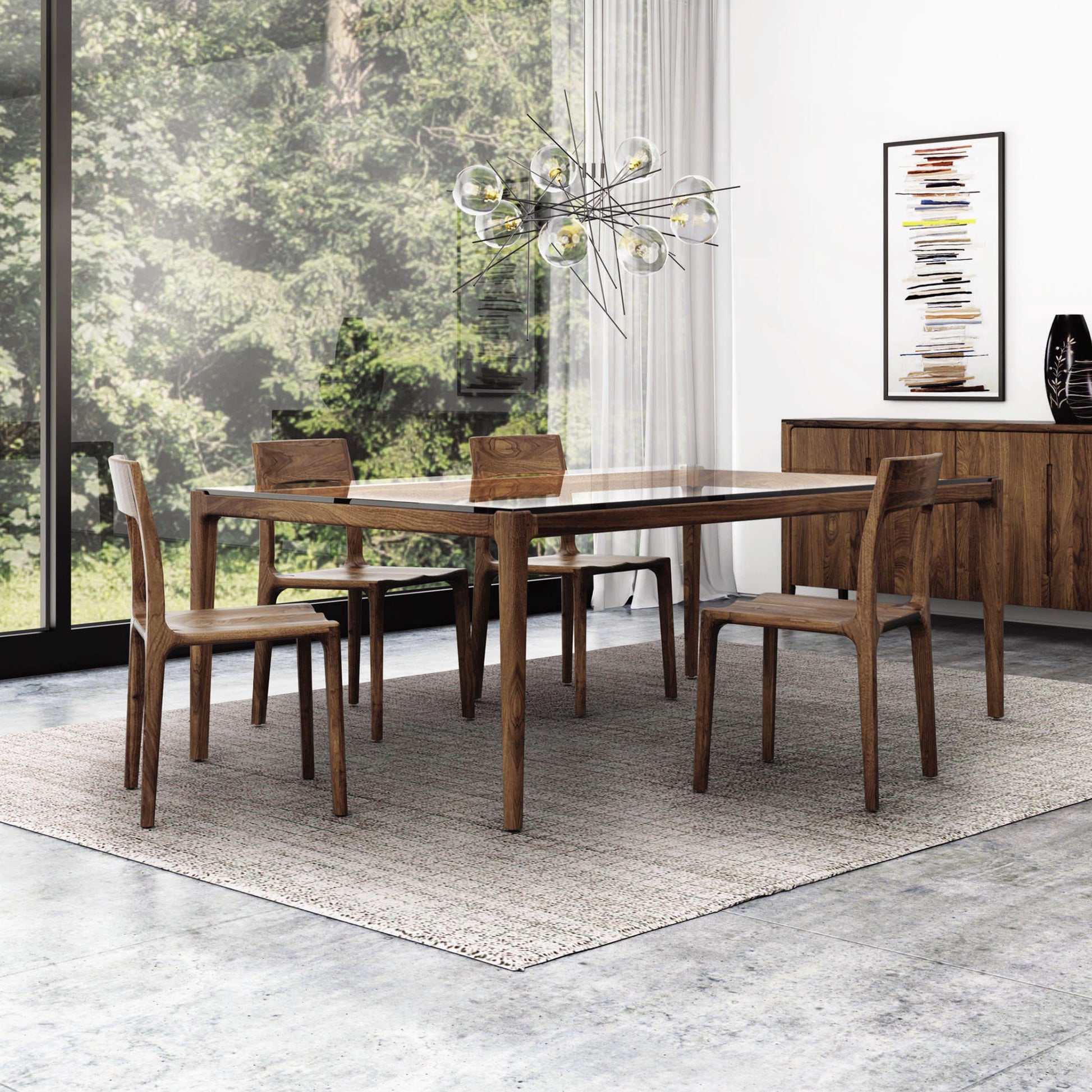 Copeland Furniture Lisse Glass Top Dining Table on a gray rug.