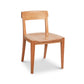Ludlow Side Chair by Vermont Woods Studios with a curved backrest, four straight legs, and sleek modern wood design, crafted in America.