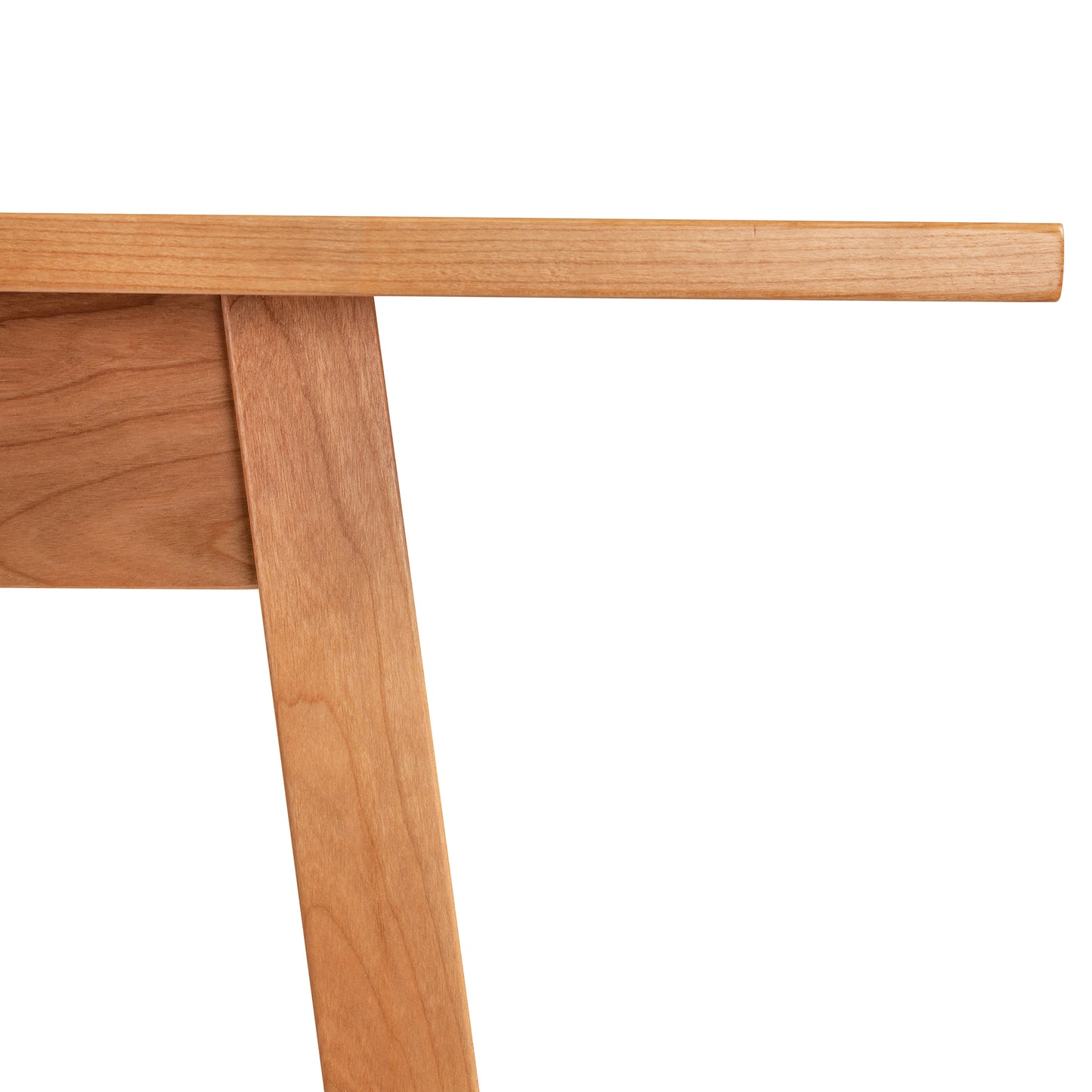 Manchester Cherry Compact Desk by Vermont Woods Studios features solid cherry wood and angled legs, highlighting expert American craftsmanship.