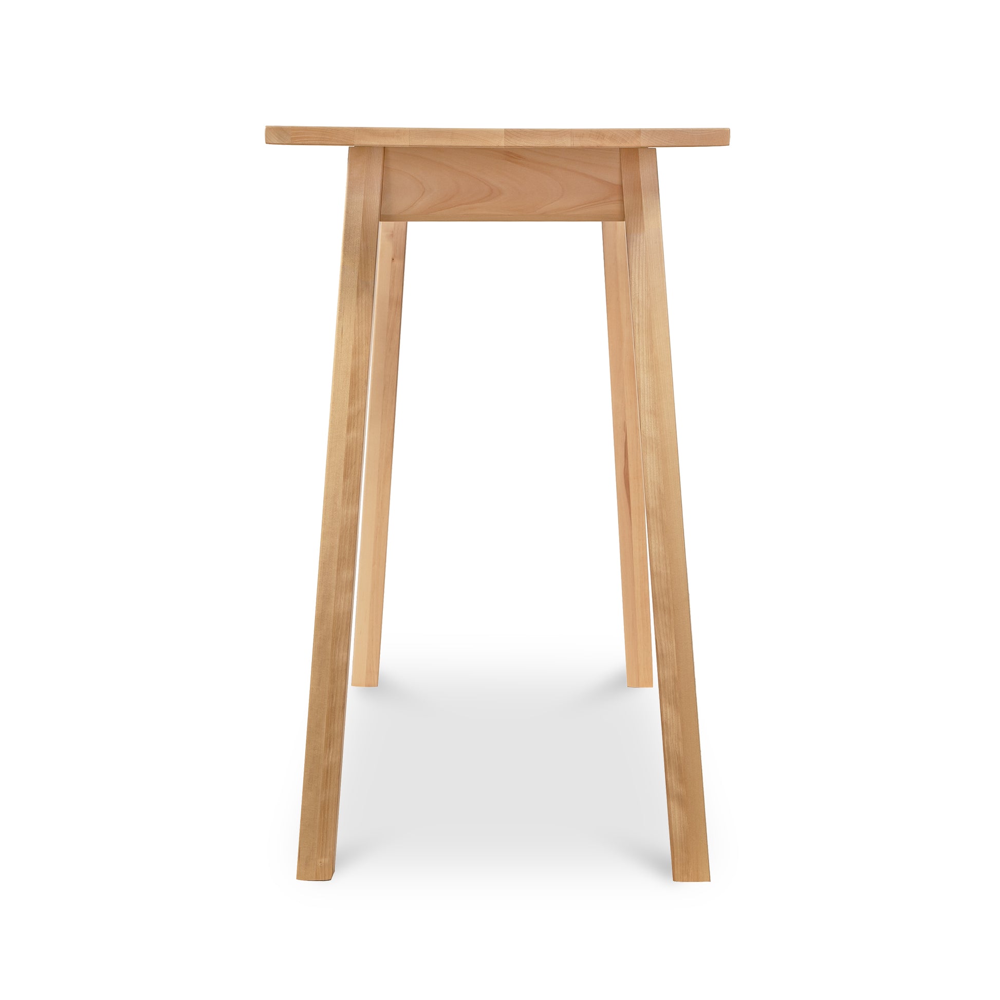 Manchester Compact Desk in light birch wood, handcrafted by Vermont Woods Studios, shown from the front to highlight its design and craftsmanship.