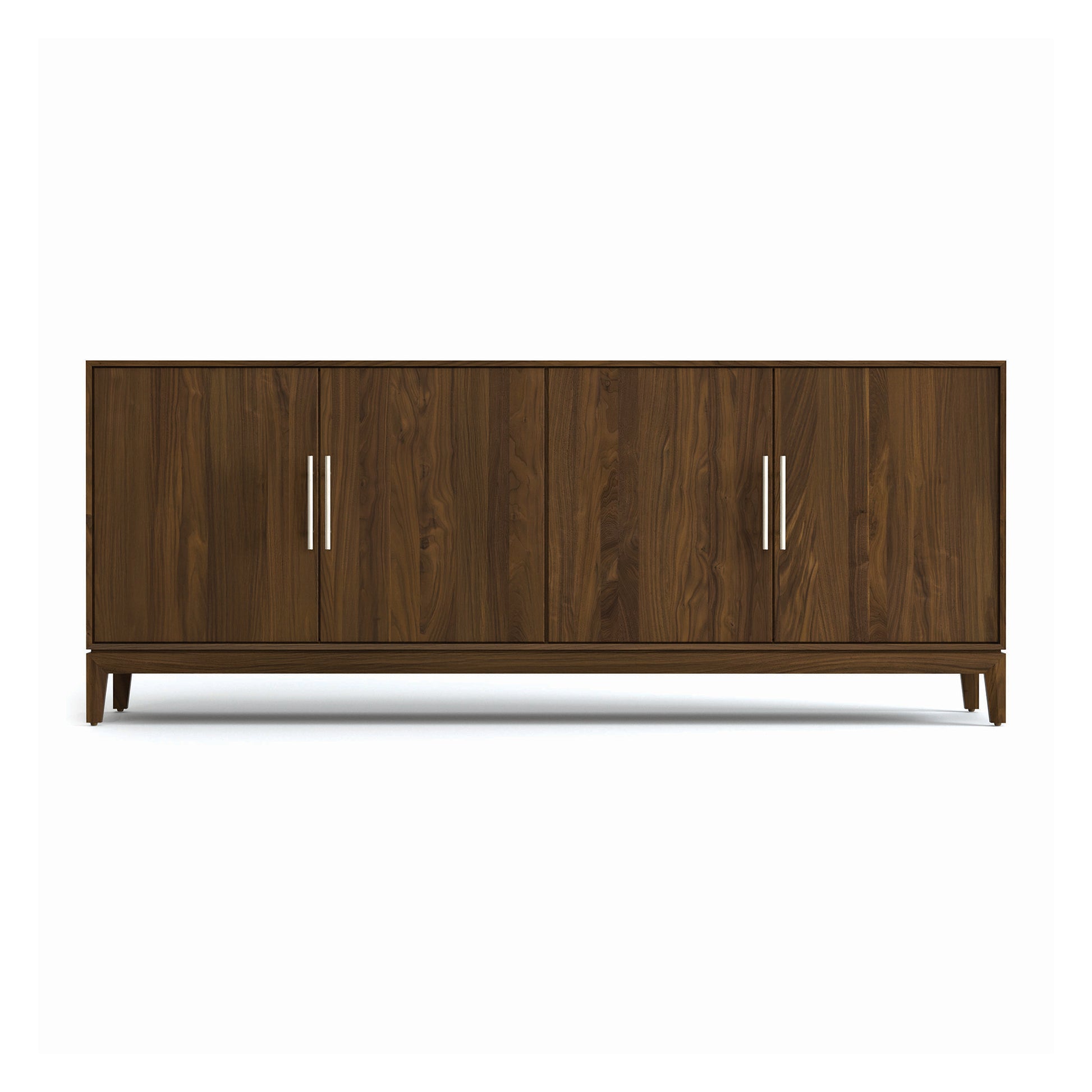 Copeland Furniture Mansfield Media Console with four doors, vertical metal handles, and angled legs crafted in high quality American hardwood.