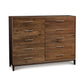 Mansfield 10-Drawer Dresser by Copeland Furniture featuring sleek metal handles and rich North American hardwood grains.