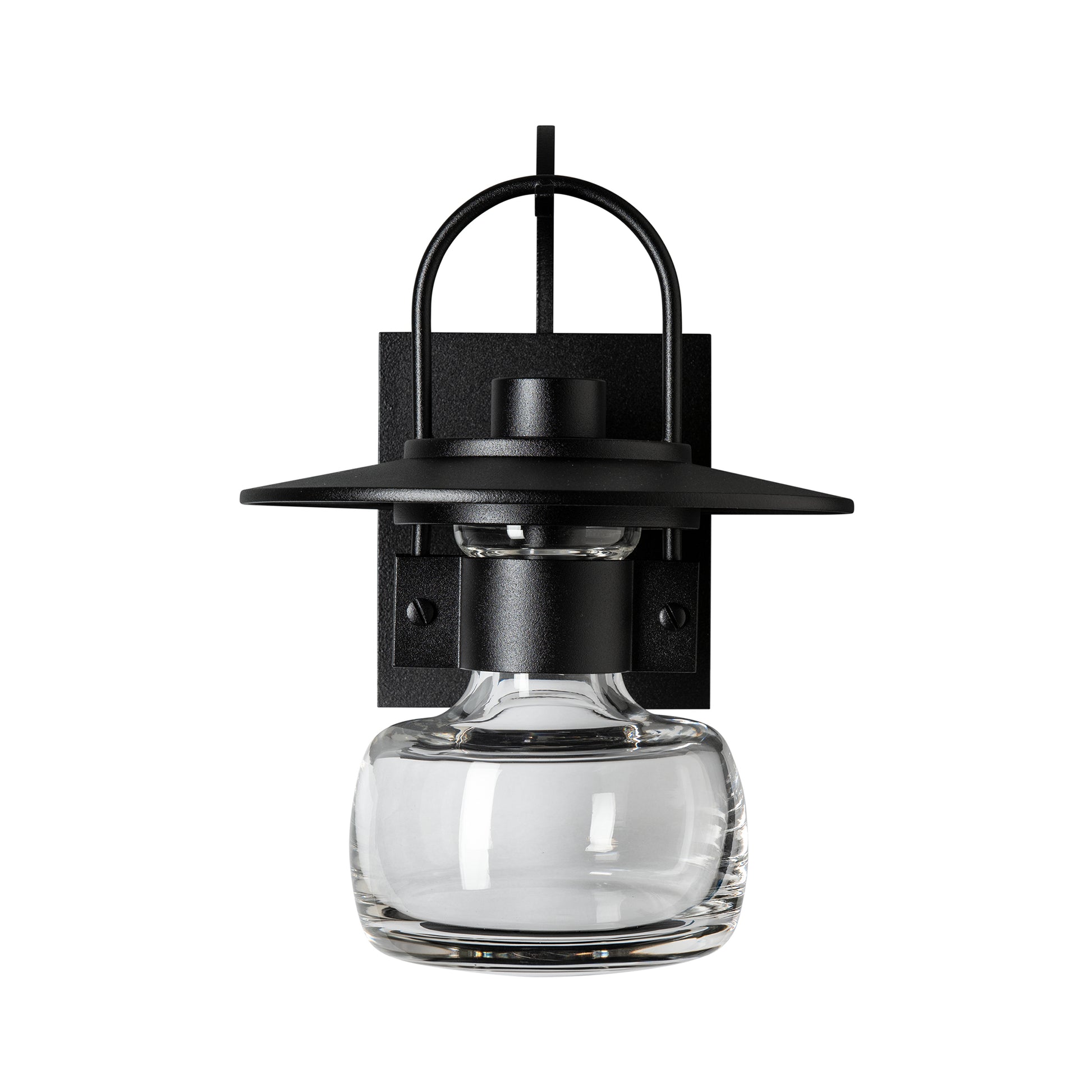 The Mason Outdoor Sconce by Hubbardton Forge showcases black metal craftsmanship, a curved arm, flat shade, and artisan clear hand-blown glass.