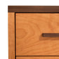 Engelhard 3-Drawer Nightstand by Vermont Furniture Designs features rich hardwood grain and sleek handles, highlighting fine American craftsmanship.