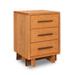 Vermont Furniture Designs Modern American 3-Drawer Nightstand with dark handles and block legs, crafted in solid wood, shown close up.