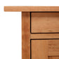 Modern Craftsman 1-Drawer Nightstand crafted from solid hardwood, showcasing its sleek design, fine craftsmanship, and elegant wood grain.