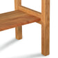 Vermont Furniture Designs Modern Craftsman 2-Drawer Console Table showcasing its elegant smooth surface and robust hardwood legs.