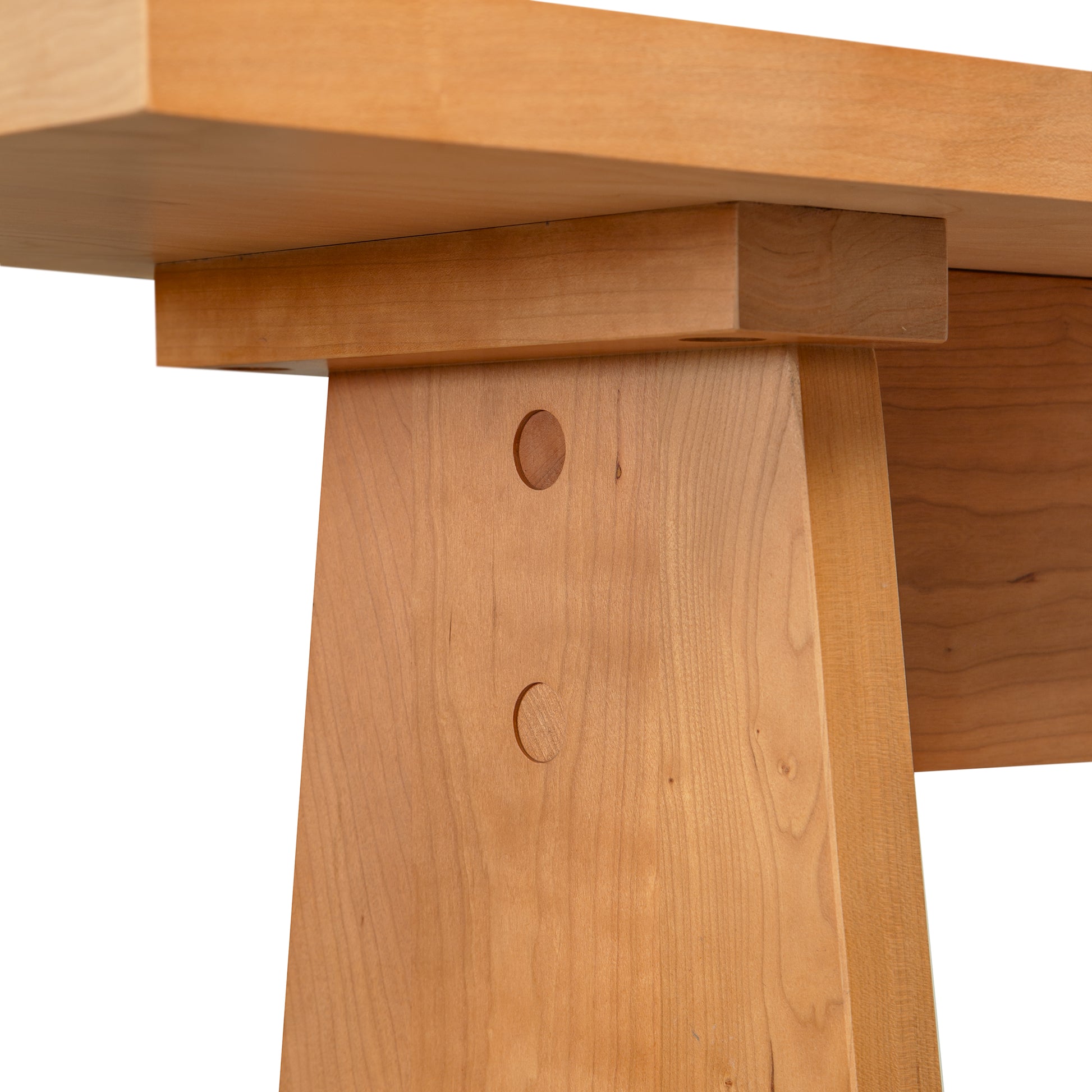 Detail of Modern Sofa Table leg by Lyndon Furniture, showcasing expert joinery craftsmanship and premium natural wood finish, American made.
