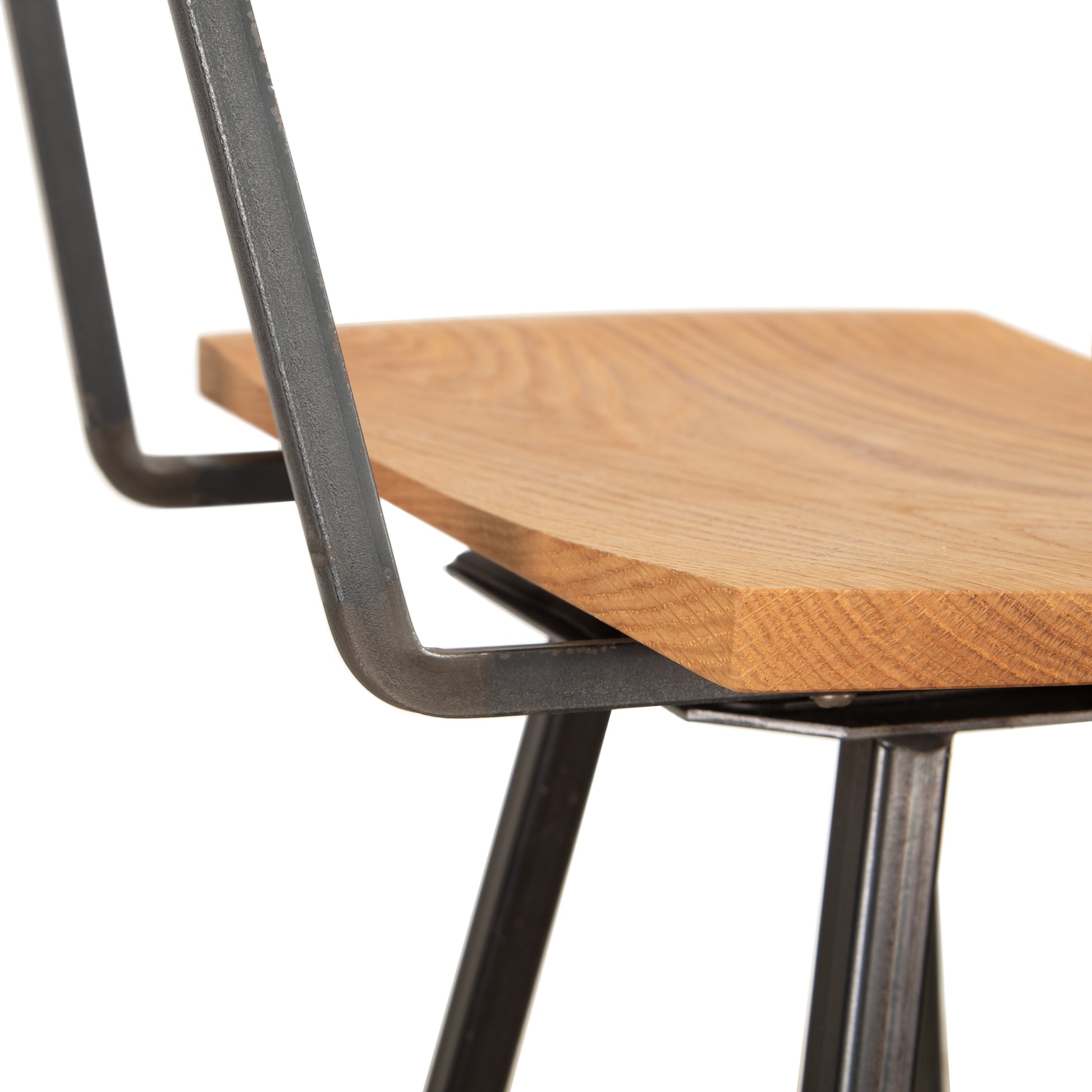 Modern Industrial Bar Stool with Back in Oak from Vermont Woods Studios, showing detailed craftsmanship and elegant corner design.