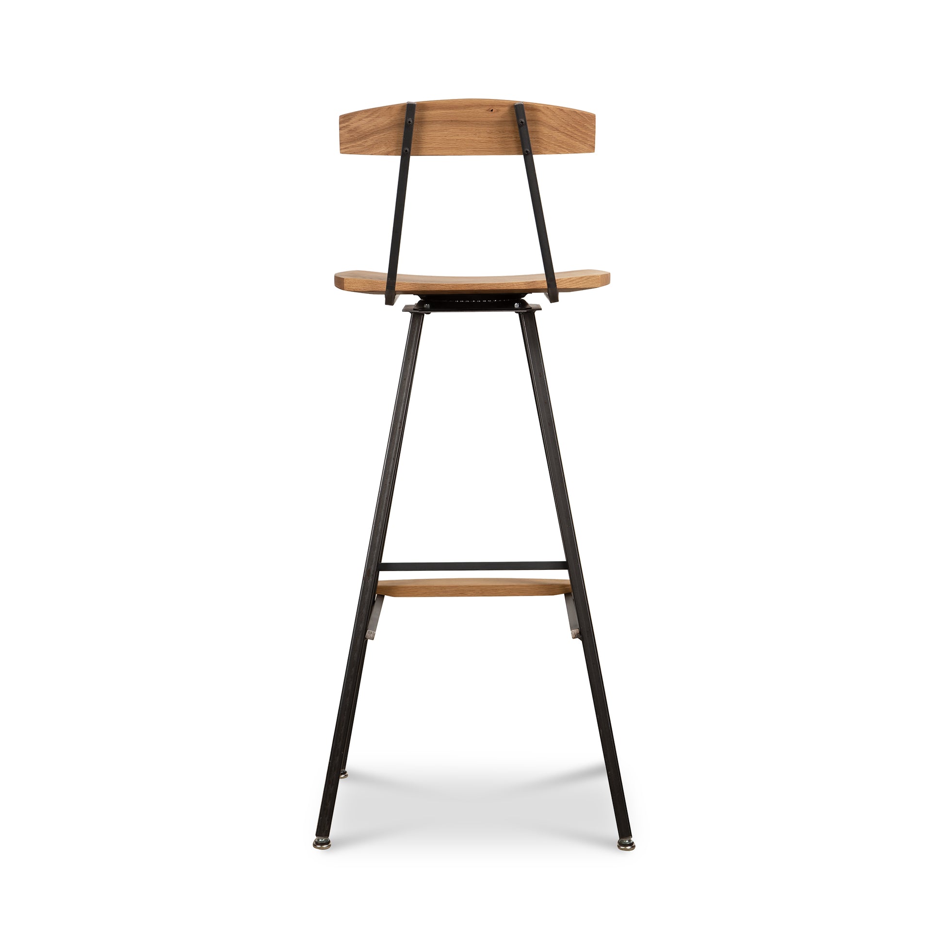 Modern Industrial Bar Stool with back from Vermont Woods Studios, crafted in oak with a wooden seat and sturdy black metal legs.