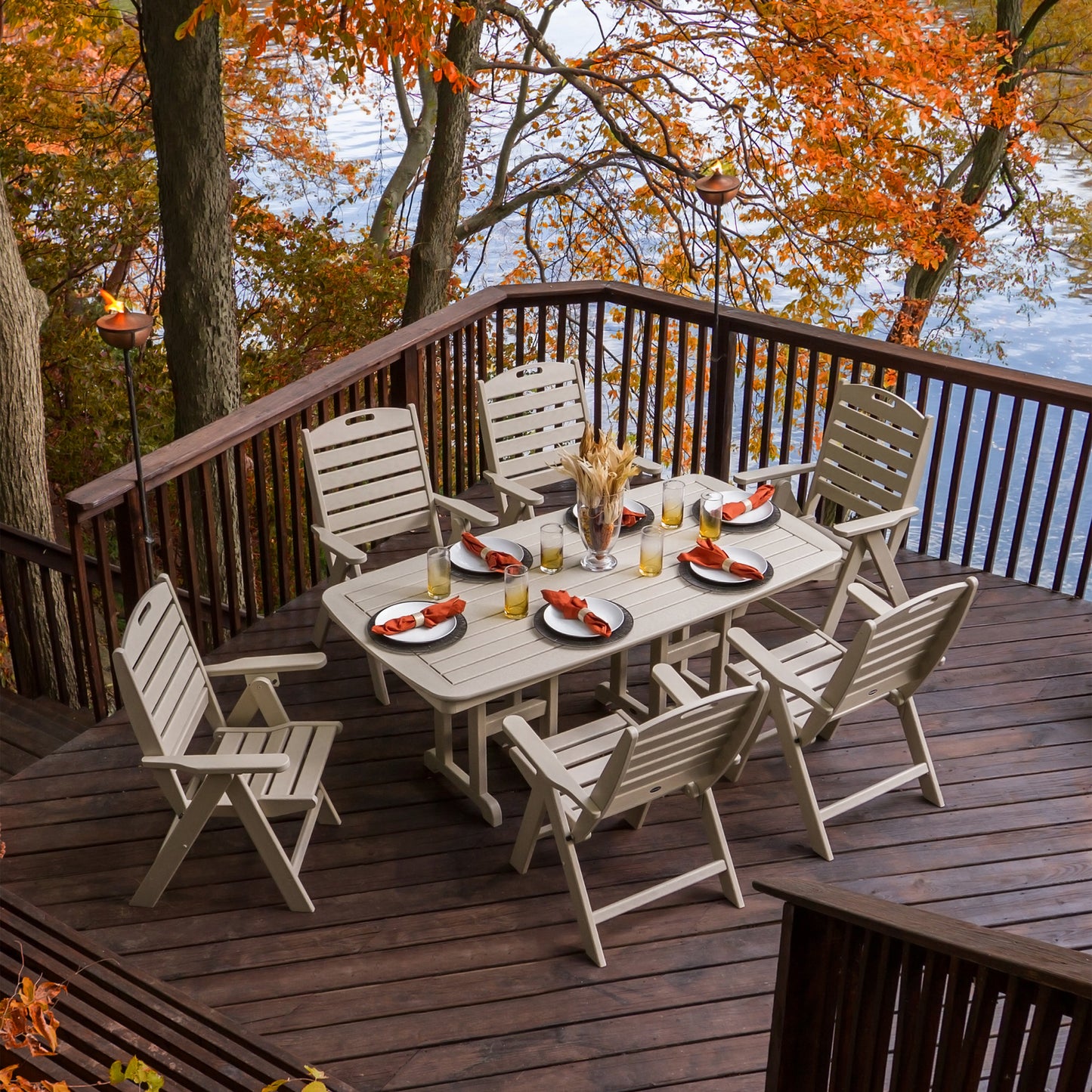 Eight POLYWOOD Nautical Highback Folding Dining Chairs arranged on a deck, showcasing durable American-made outdoor furniture.