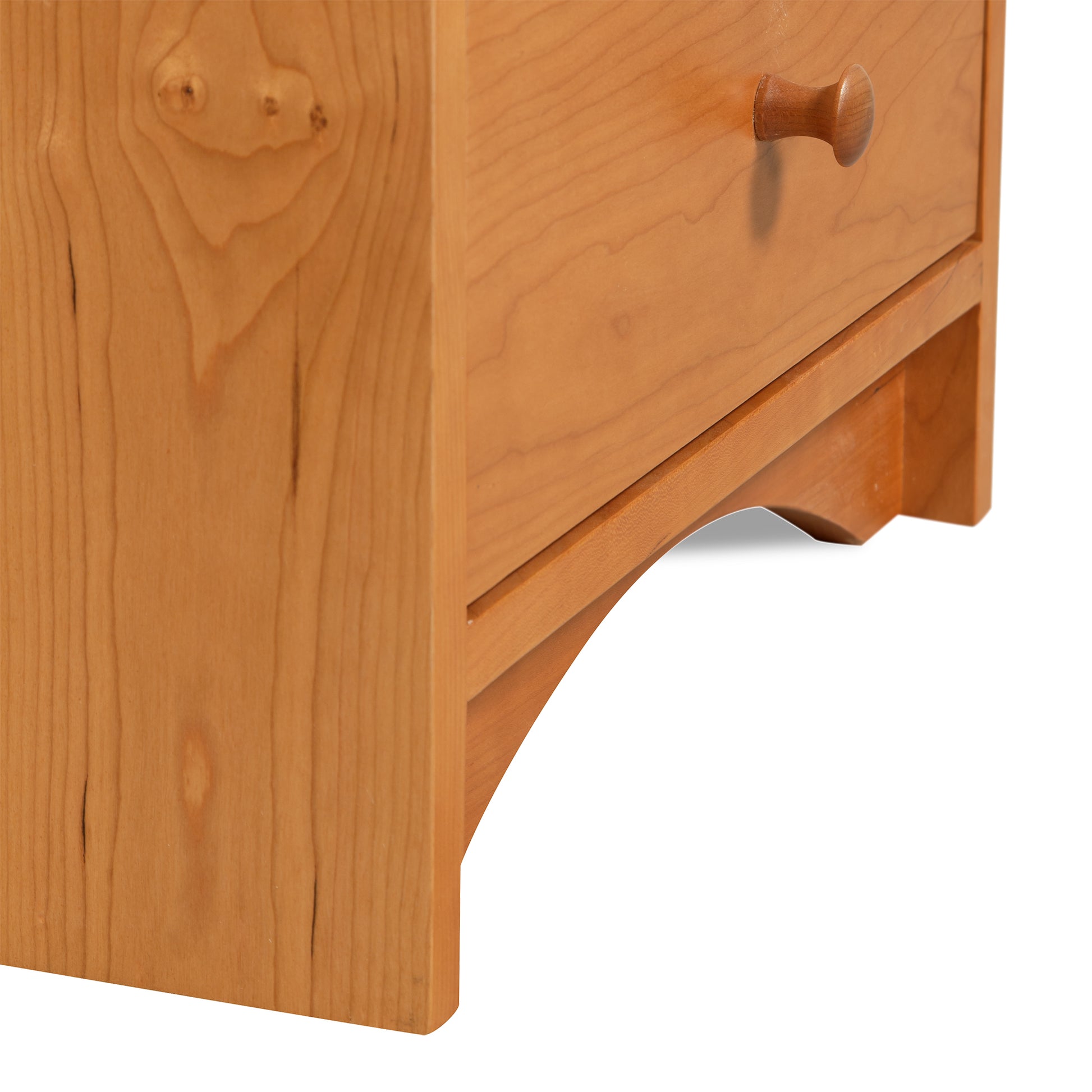 New England Shaker 3-Drawer Nightstand by Lyndon Furniture, featuring an arched base and detailed drawer fronts in solid wood craftsmanship.