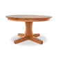 Lyndon Furniture New Traditions Round Pedestal Table with a thick hardwood top and sturdy base, showcasing elegant American craftsmanship.