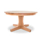 New Traditions Round Pedestal Table by Lyndon Furniture, crafted from solid hardwood with a sturdy thick base and four angled legs.