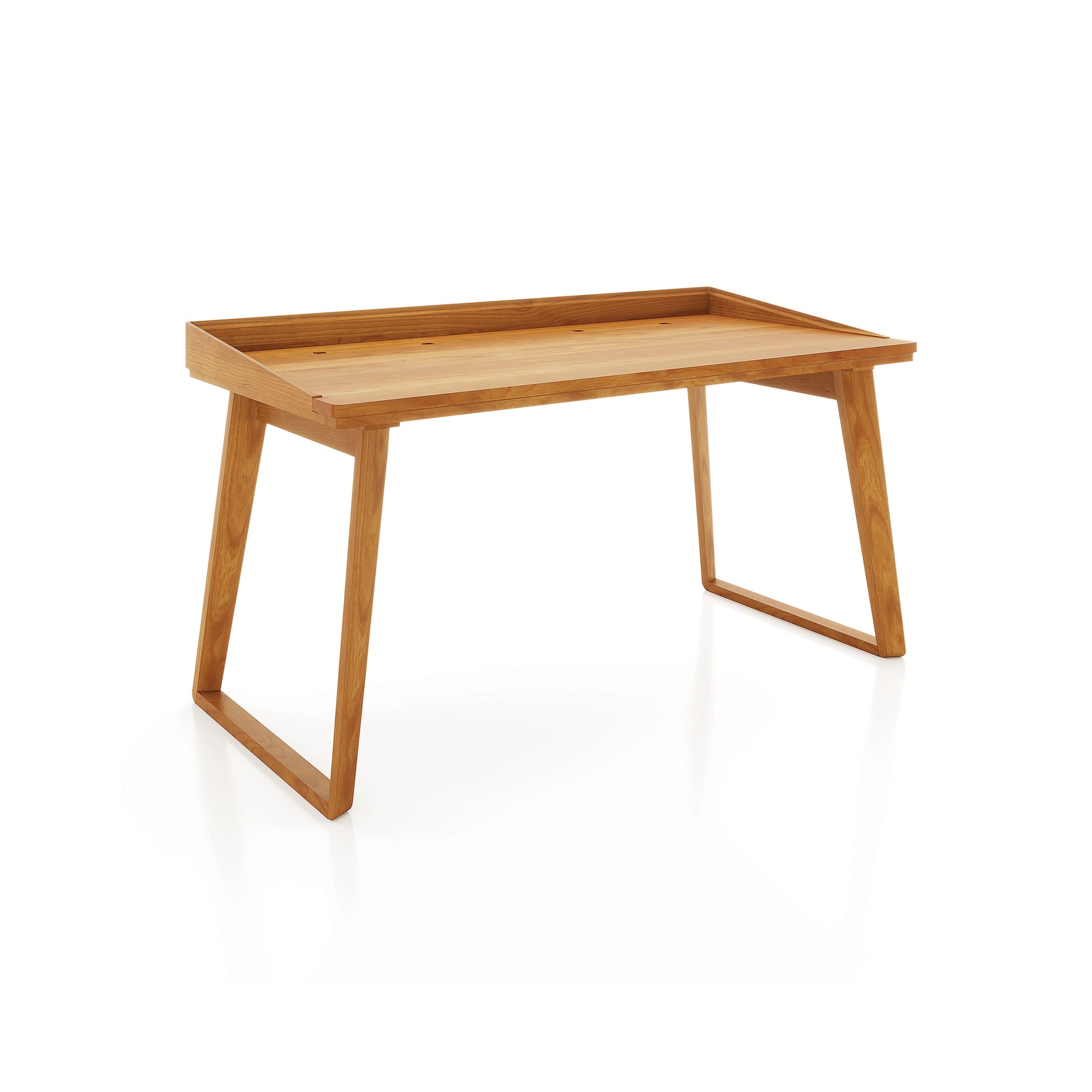 Odin Desk by Copeland Furniture with angled legs and raised edge, crafted in America for modern offices. Focus on desk; minimal background.