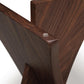 Copeland Furniture Planes Round Glass Top End Table featuring solid walnut panels, smooth edges, and a clear glass surface.