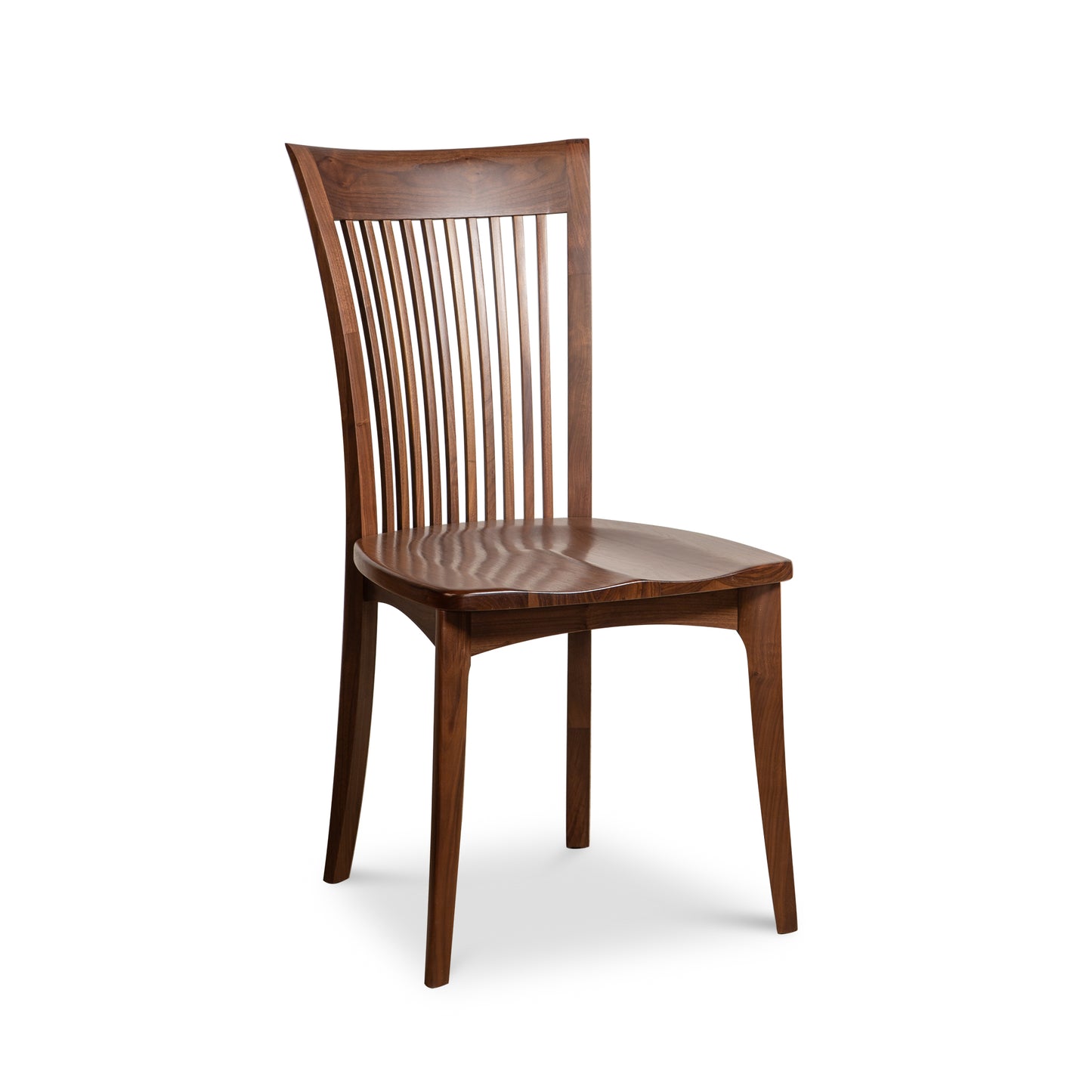 Copeland Furniture Sarah Shaker Chair crafted from American cherry wood with a curved slatted back, highlighting its quality craftsmanship.