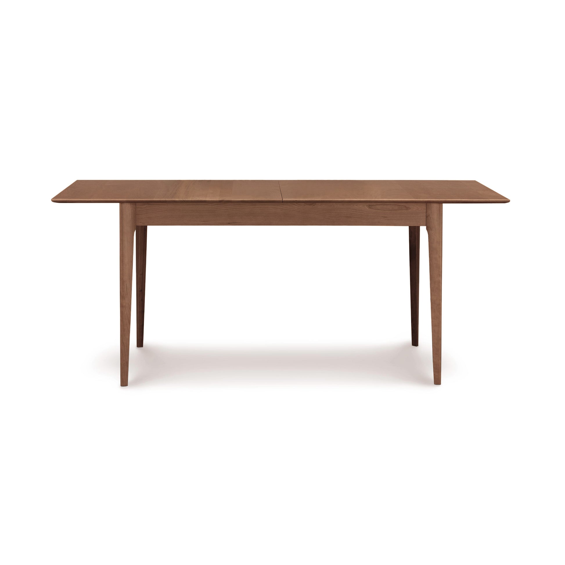 Copeland Furniture Sarah Shaker Tapered Leg Extension Table crafted in solid wood, highlighting its elegant design and craftsmanship.