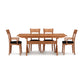 Copeland Sarah Shaker Trestle Extension Table with four Shaker collection chairs featuring black cushions, showcasing finely crafted wood furniture.