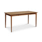 Copeland Furniture Sarah Large Desk in solid wood, with four tapered legs and a smooth rectangular top, showcases fine American craftsmanship.