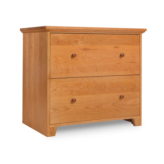 Lyndon Furniture Shaker 2-Drawer Lateral File Cabinet in natural cherry wood with round handles, highlighting its classic American craftsmanship.