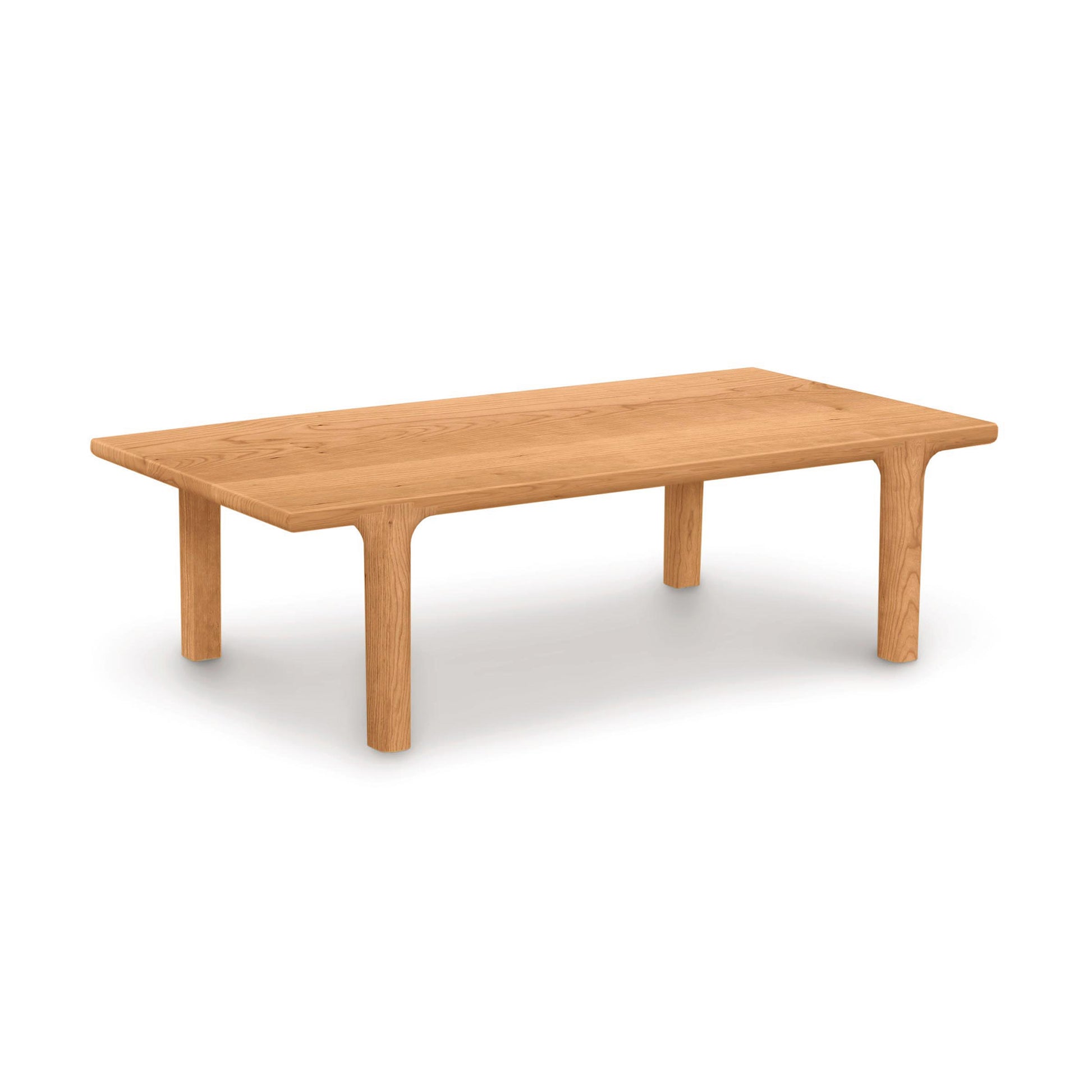 Sierra Rectangular Coffee Table by Copeland Furniture featuring thick hardwood legs and a customizable wood finish, showcasing American craftsmanship.