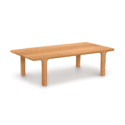 Sierra Rectangular Coffee Table by Copeland Furniture featuring thick hardwood legs and a customizable wood finish, showcasing American craftsmanship.