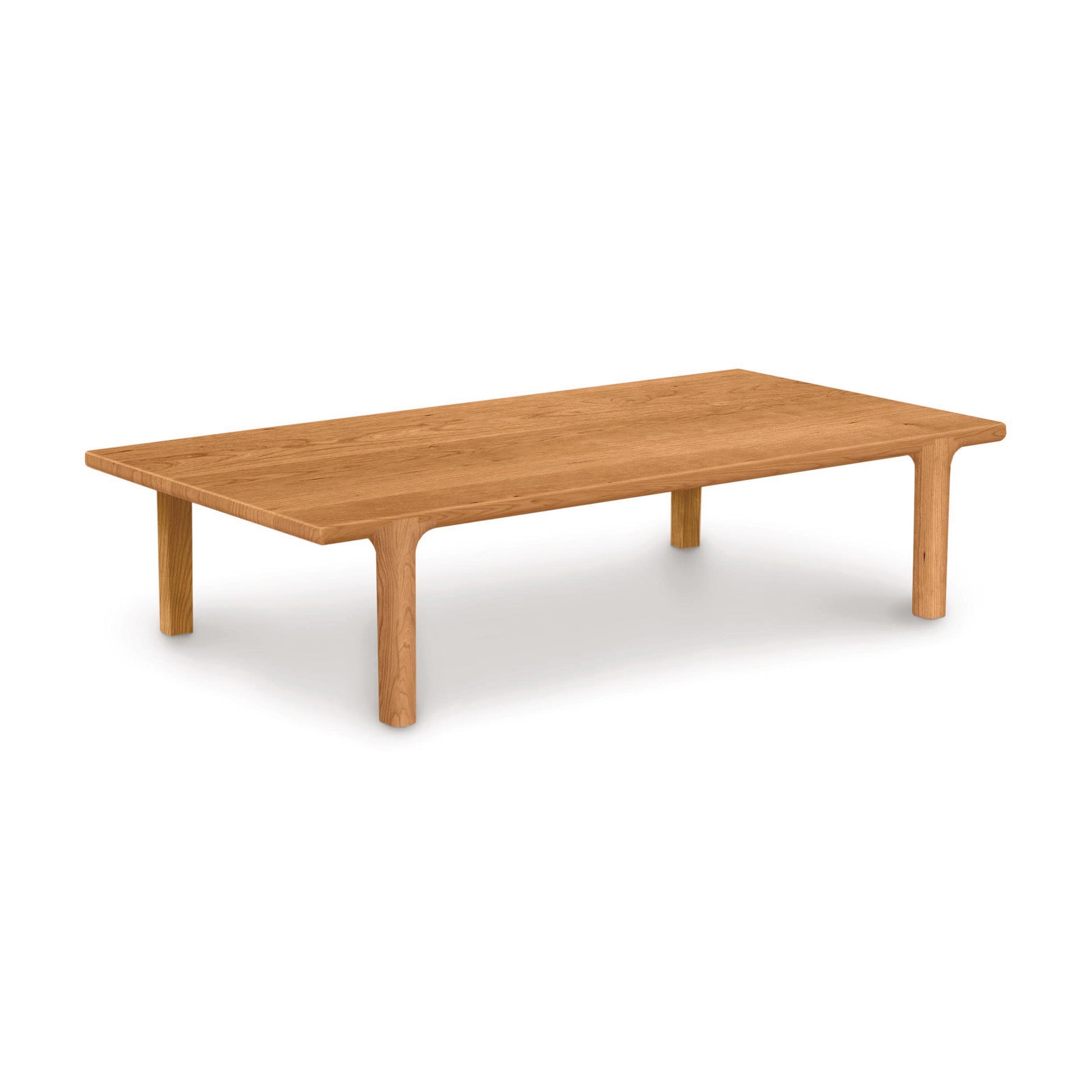 Sierra Rectangular Coffee Table by Copeland Furniture, crafted from North American hardwood with a minimalist design, showcases smooth lines and fine craftsmanship.