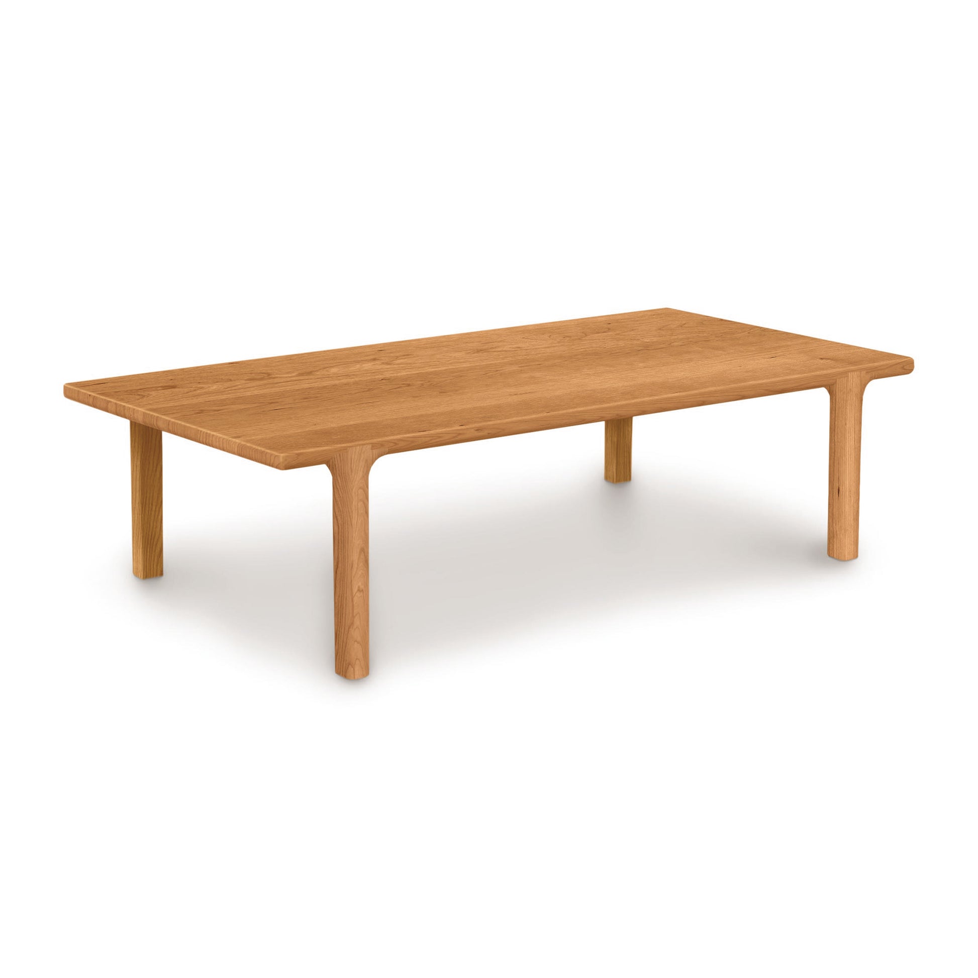 Sierra Rectangular Coffee Table by Copeland Furniture, featuring a smooth hardwood top and rounded legs, expertly crafted from North American wood.